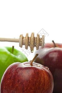 粘贴在白色上孤立的蜂蜜和苹果黄色水果酱料美食棕色液体金子文化糖浆食物图片
