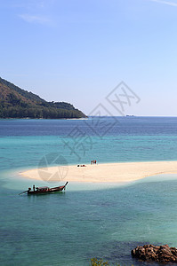 泰国利佩岛清水和蓝天空晴天海洋海滩蓝色血管珊瑚假期海岸海景岩石图片
