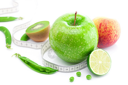 以白色隔绝的磁带和测量胶带权重蔬菜维生素食物公制饮食收藏生活水果奇异果图片