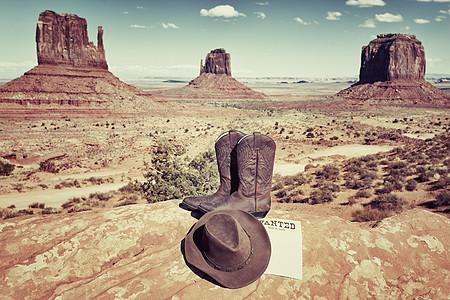 靴子 帽子和纪念碑谷图片