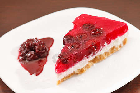 樱桃芝士蛋糕水果食物浆果甜点红色背景图片