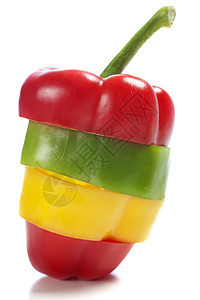 三个胡椒混合成一个生产蔬菜黄色红色绿色图片