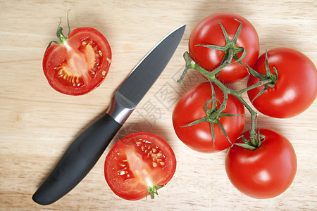 切碎板上新鲜西红柿烹饪红色食物图片