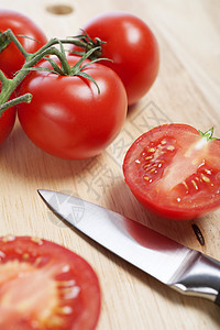 切碎板上新鲜西红柿食物烹饪红色图片