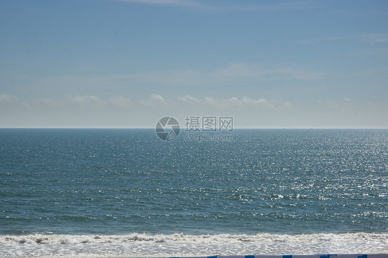 海滩天空和波浪背景图像图片