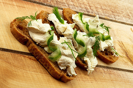 奶干奶酪三明治早餐美食家奶油白色棕色绿色午餐背景面包食物图片