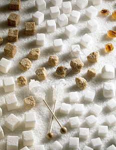 含糖尚可食糖食物白色静物肿块块糖棕色糖果内饰营养蔗糖图片