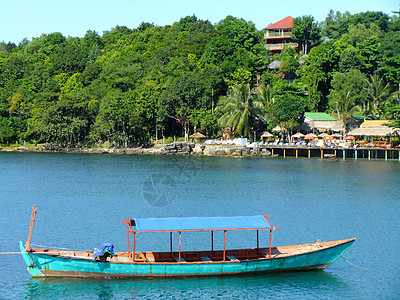 柬埔寨传统木制船绿色海岸线海湾支撑旅游热带天堂竹子钓鱼海洋图片