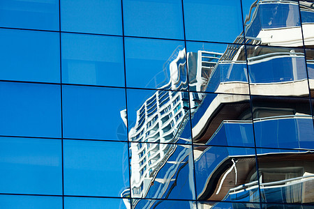 玻璃现代办公大楼背景面的图像摩天大楼银行住宅反射窗户角落马赛克蓝色办公室技术图片