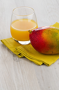 新鲜芒果汁果汁黄色橙子甜点果味水果情调服务水壶异国图片