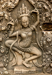 在拜隆寺上微笑着的面目历史石头砂岩蓝色建筑寺庙上帝高棉语艺术宗教图片