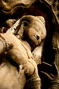在拜隆寺上微笑着的面目旅游高棉语历史寺庙考古学雕刻雕塑天空石头文化图片