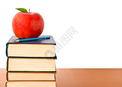 书塔 苹果在白色上被隔绝图书馆智慧学习学士教育脊柱百科文学精装桌子图片