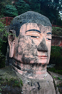 巨大的佛祖佛教徒建筑学宗教旅行废墟粉色寺庙雕像岩石雕刻图片