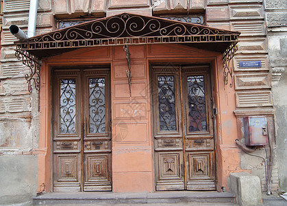 旧门装饰框架警戒线宽慰铁匠城市门锁风格格子建筑图片
