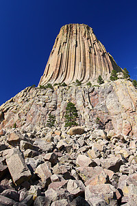 怀俄明州的魔鬼塔阳光岩石栖息地荒野公园地形旅行纪念碑风景石头图片