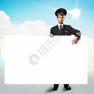 以持有空广告牌的形式进行试点喷射飞行员绘画木板领导者队长卡片纸板指挥官男性图片