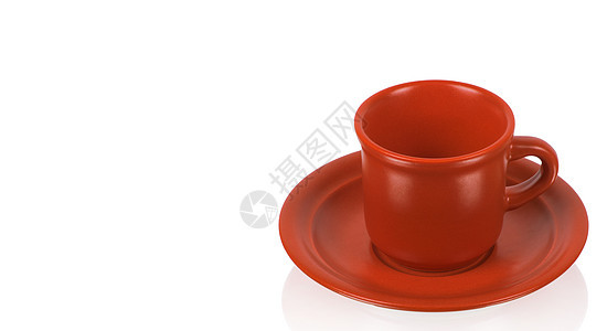 红杯在红碟上飞碟咖啡店陶瓷咖啡饮料食物制品杯子盘子反射图片
