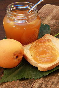甜杏子酱果酱水果黄油小吃橙子果汁早餐食物图片