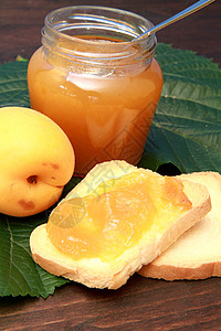 甜杏子酱果酱橙子小吃果汁水果黄油食物早餐图片