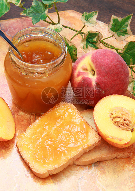 甜甜桃果酱食物维生素玻璃水果杂货面包装罐环境早餐烹饪图片