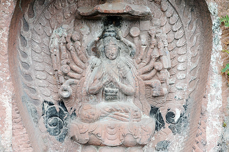 古佛像雕像岩石佛教徒石头粉色文物雕刻旅行建筑学洞穴图片