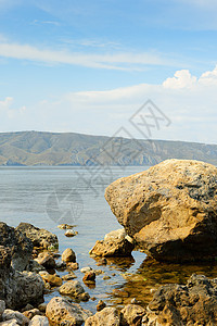 海岸的巨石波浪反射地平线海岸线潮汐场景海洋石头海景美丽图片