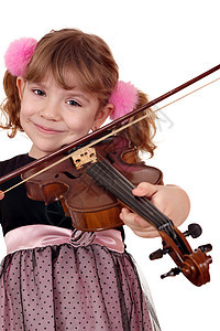 带着小提琴的美丽小女孩图片