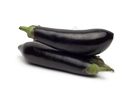 白背景的茄子或黄醋蔬菜食物紫色黑色小吃美食节食营养圆形白色健康图片