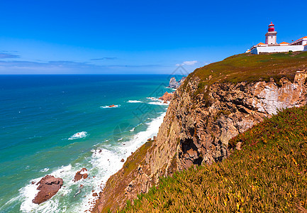 葡萄牙地标爬坡旅游岩石海景海洋天空海浪灯塔蓝色图片