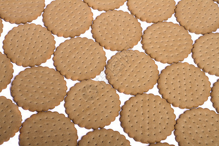 许多饼干小吃圆圈蛋糕工作室白色甜点糕点圆形营养棕色图片