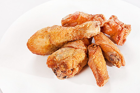 炸鸡翅膀食物棕色香料白色小吃油炸午餐图片