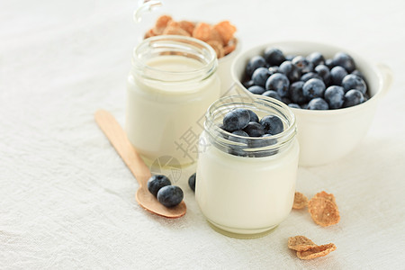 健康早餐勺子乳白色奶制品产品甜点奶油水果饮食玻璃谷物图片