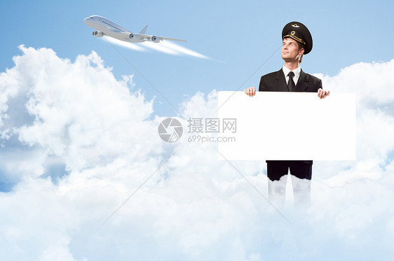 以持有空广告牌的形式进行试点旅游标语卡片邮政绘画航空广告喷射蓝色飞行员图片