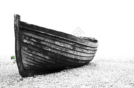旧渔民船支撑海洋白色鹅卵石卵石沉船破坏帆船运输海岸图片