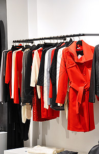 服装店红色店铺购物精品外套黑色展示裙子衣服零售图片