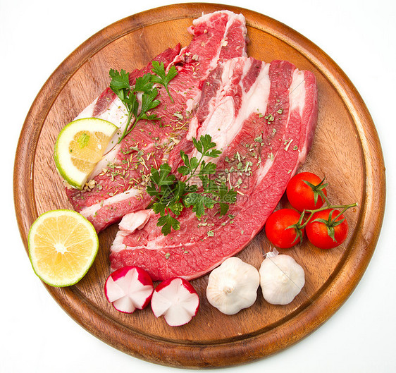 肉肉 生牛肉烹饪炙烤牛扒萝卜百里香屠夫香菜烧烤红色花束图片