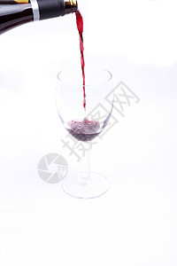 一杯白底红葡萄酒周年纪念日饮料庆典环境奢华酒瓶酒杯红色空白图片