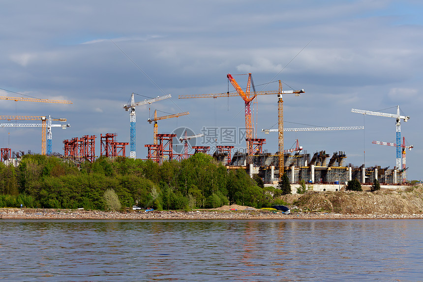 工地上的起重机金属结构职业建筑学摩天大楼建筑建造韧性天空活动图片