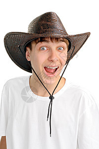 戴斯特森帽的青少年喜悦男性衣服衬衫白色帽子牛仔牙齿幸福青年图片