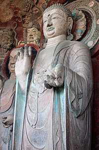 古老的佛教雕像艺术佛教徒石头宗教岩石雕刻上帝雕塑旅行背景图片