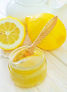 蜂蜜和柠檬宏观寒意青柠琥珀色甘菊产品液体食物玻璃小麦图片