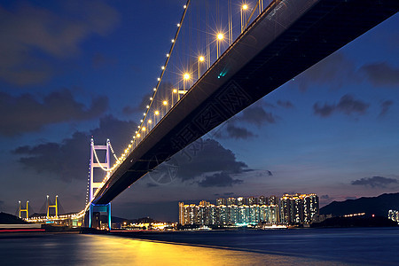夜里香港清马桥游客反射海岸连接器地标电缆天空运输黑色天际图片