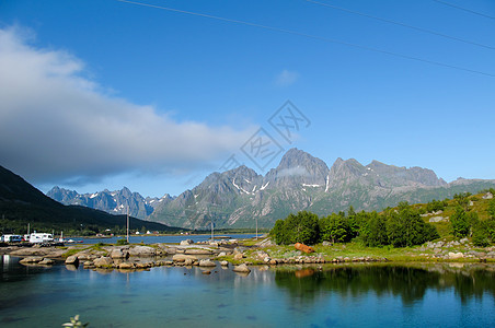 挪威景观挪威太阳晴天旅行游客乡村海岸海湾自由爬坡旅游图片