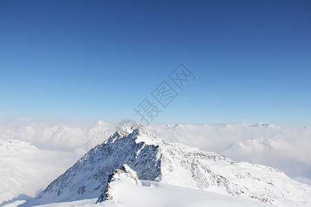 山峰峰天空季节旅行天气日出环境滑雪童话高山旅游图片