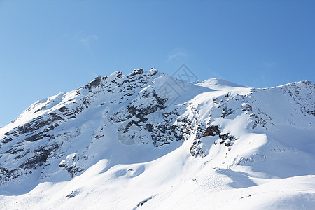 山峰峰天空阳光全景首脑天气季节童话环境滑雪旅行图片