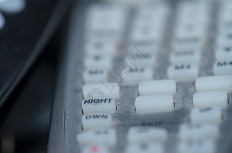 特写远程控制器导航控制电子视频红外线体积力量按钮键盘白色图片