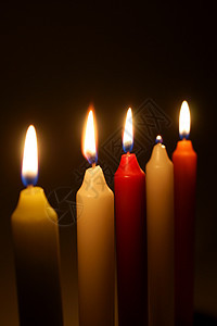 燃烧蜡烛温暖黑色宏观黄色红色火焰纪念橙子图片