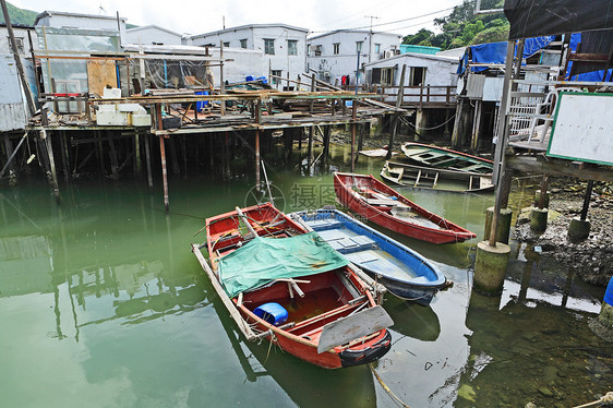 Taa O渔村风化旅行蓝色棚户区木头村庄窝棚住宅钓鱼天空图片