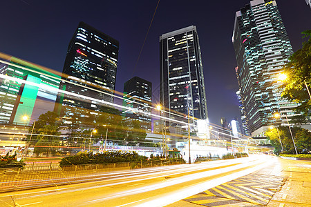 夜间穿越城市的交通地平线土地方法运输场景蓝色市场金融建筑物旅游图片